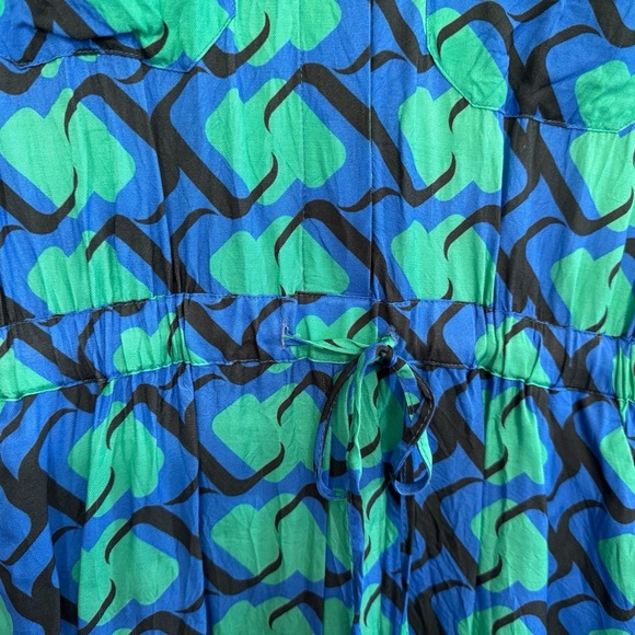 adL Blue, Green, Black Patterned Jumpsuit Romper with Cinched Waist and Collar. - Picture 4 of 8